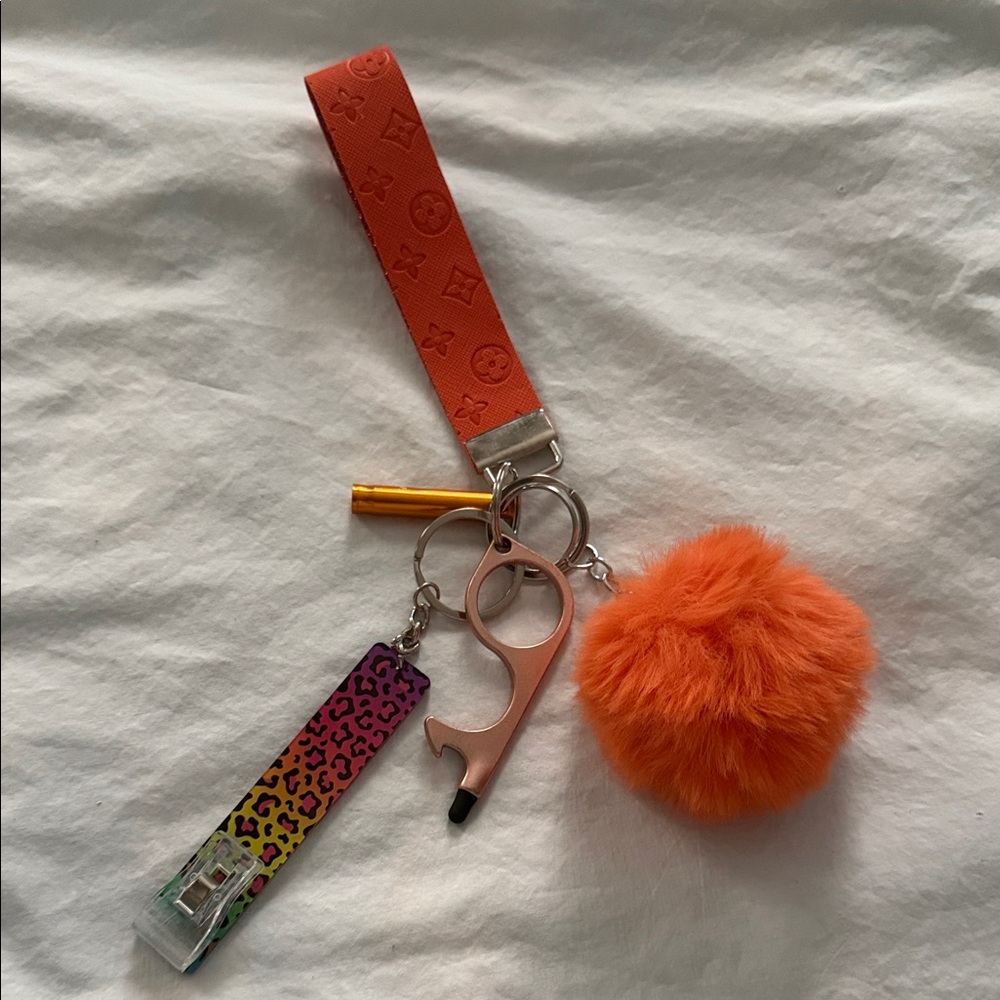 Orange Pom Pom Keychain with Leopard Print Strap